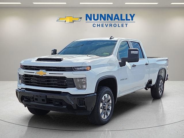 2025 Chevrolet Silverado 2500 HD Custom in Summit White — front three-quarter view