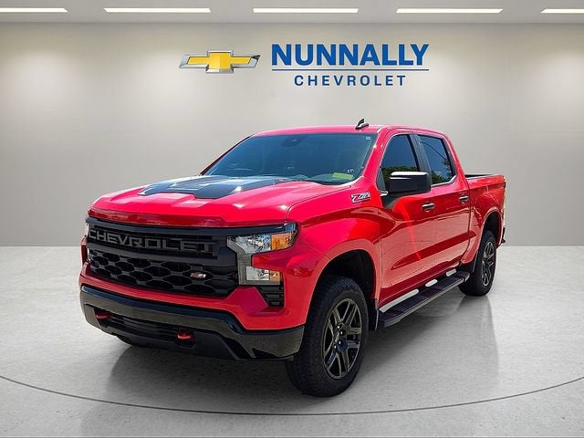 2023 Chevrolet Silverado 1500 Custom Trail Boss in Red Hot — front three-quarter view